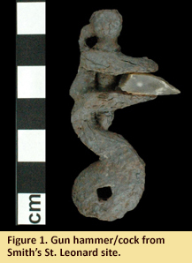 Image of flint lock found at the Smith-St. Leonard site with flint still attached.