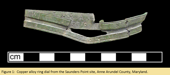 Figure 1:  Copper alloy ring dial from the Saunders Point site, Anne Arundel County, Maryland.