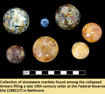 Collection of stoneware marbles was found among the collapsed timbers filling a late 19th-century cellar at the Federal Reserve Site (18BC27) in Baltimore. 
