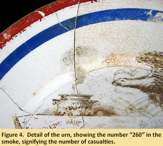 Figure 4.  Detail of the urn, showing the number “260” in the smoke, signifying the number of casualties.