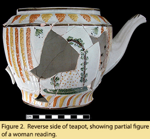 Figure 2.  Reverse side of teapot, showing partial figure of a woman reading.