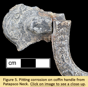 Figure 5, Pitting corrosion on coffin handle from Patapsco Neck. Cliick on image to see a larger closeup view of the pitting corrosion.