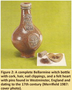 Figure 2. A complete Bellarmine witch bottle with cork, hair, nail clippings, and a felt heart with pins found in Westminster, England and dating to the 17th century. (Merrifield 1987:cover photo).