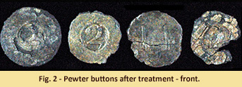 Military buttons after treatment.