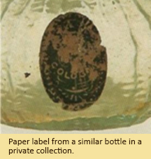 Paper label from a similar bottle in a private collection.