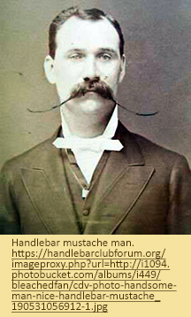 Image of man with elaborate handlebar mustache.